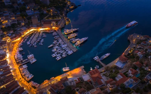 aerial shot of Hydra (Saronic Islands) port in the evening