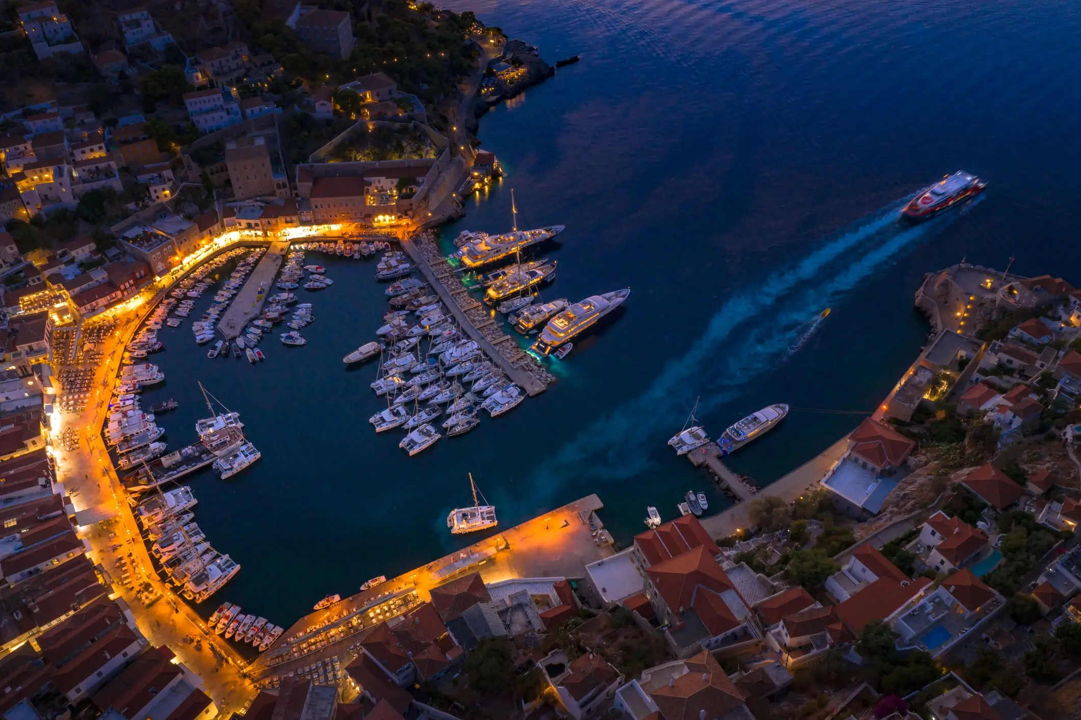 aerial shot of Hydra (Saronic Islands) port in the evening